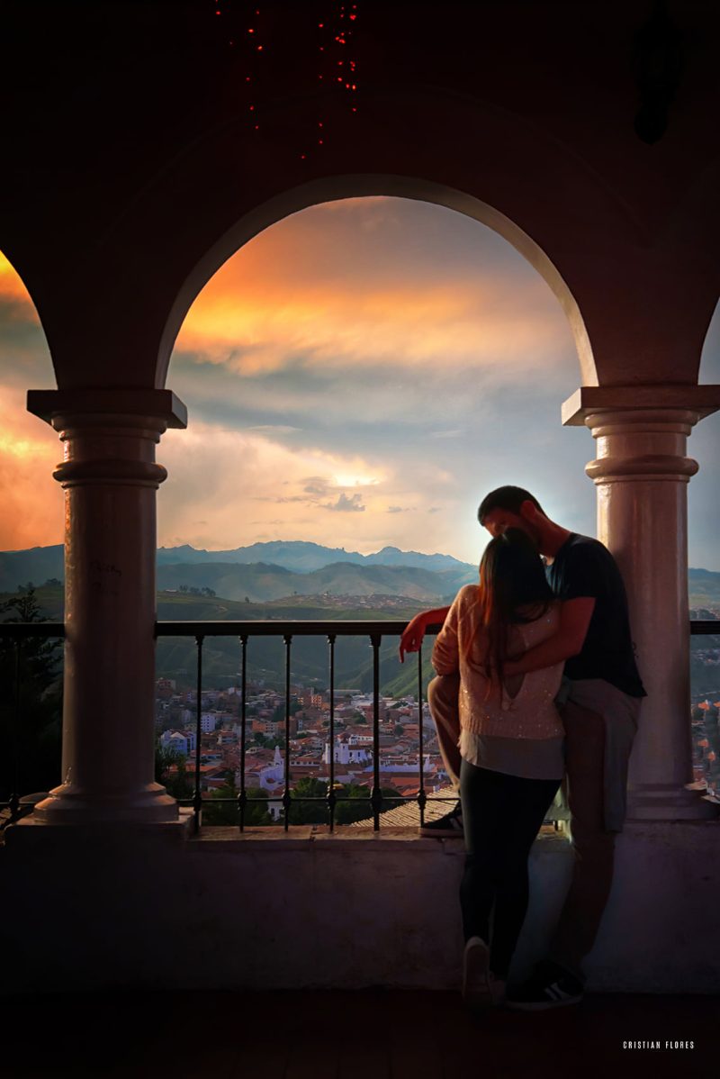 Visitors enjoying sunset views from Recoleta viewpoint in Sucre Bolivia