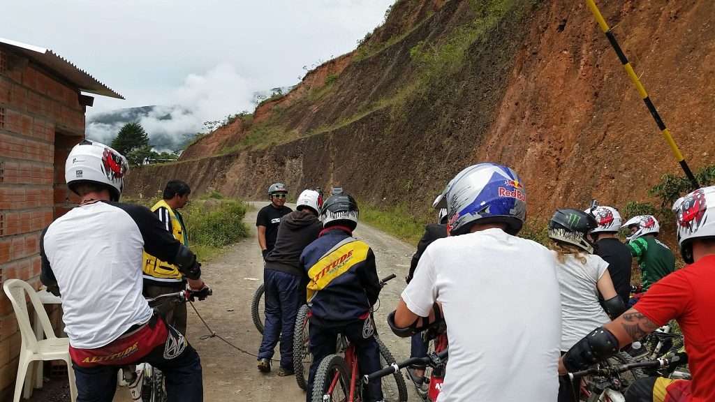 cyclists preparing for Death Road Bolivia bike tour before downhill ride in La Paz