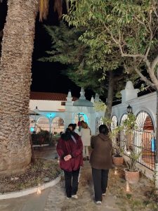 People walking with candles during Holy Week in Sucre Bolivia at night
