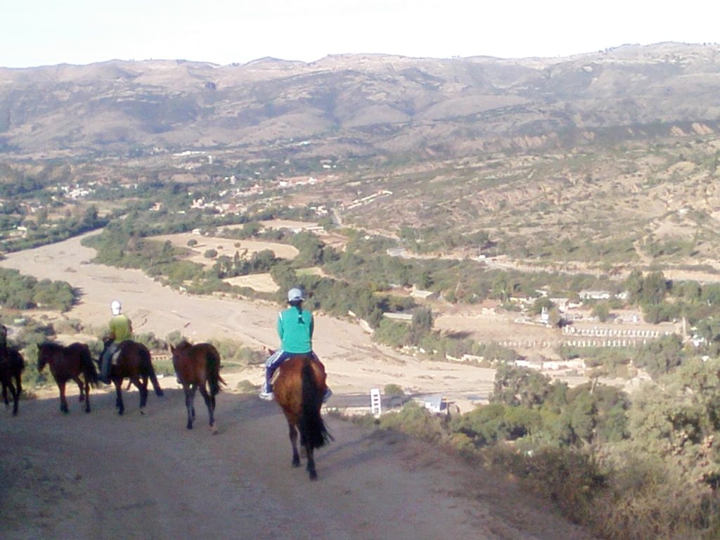 Horseback riding group enjoying panoramic views near Sucre, Bolivia
