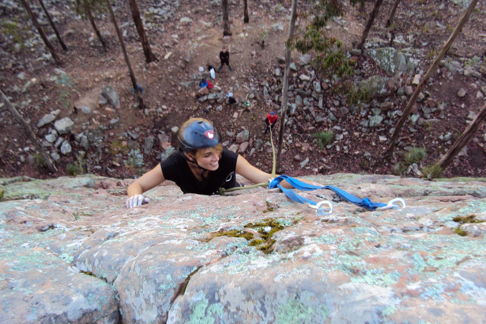 Rock climber ascending a natural wall near Sucre Bolivia
