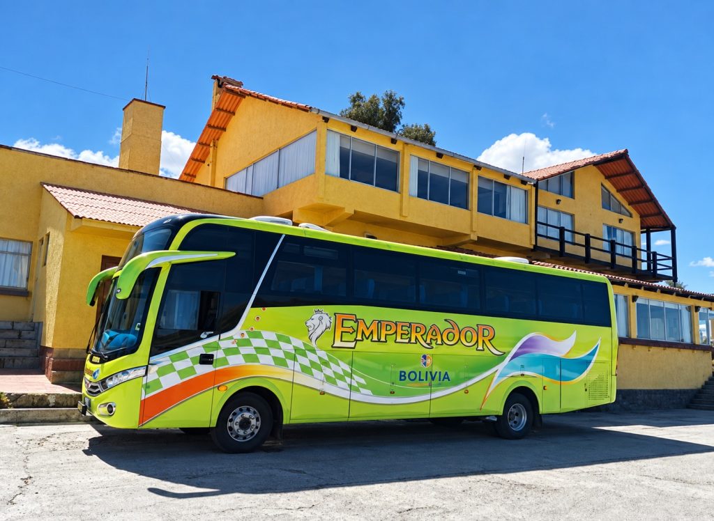 Chartered tourist bus for the Silver Oruro Carnival package from La Paz